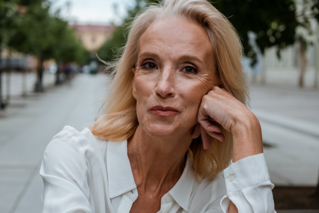 Woman in White Button Up Shirt