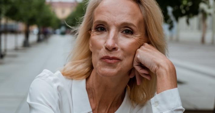 Woman in White Button Up Shirt