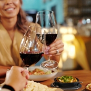 Couple in a Restaurant Drinking Red Wine