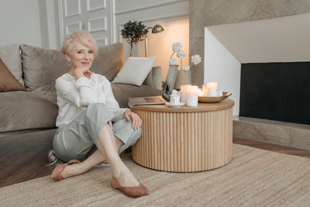 Woman in White Dress Shirt Sitting on the Floor