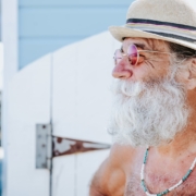 a person with a beard and hat