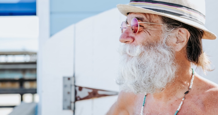 a person with a beard and hat