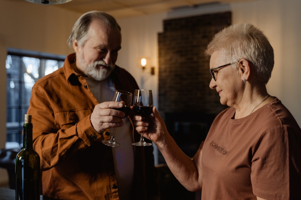 Man in Brown Button Up Shirt Holding a Wine Glass