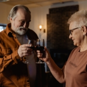 Man in Brown Button Up Shirt Holding a Wine Glass