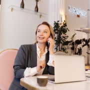 Woman Talking on Phone at Work