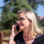 woman in black tank top wearing black framed eyeglasses