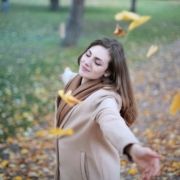 Woman Open Arms While Closed-eyes Smiling Photo