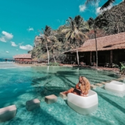 woman in swimming pool during daytime