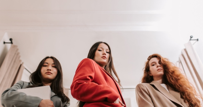 Low Angle Shot of Women Wearing Blazer while Posing at the Camera