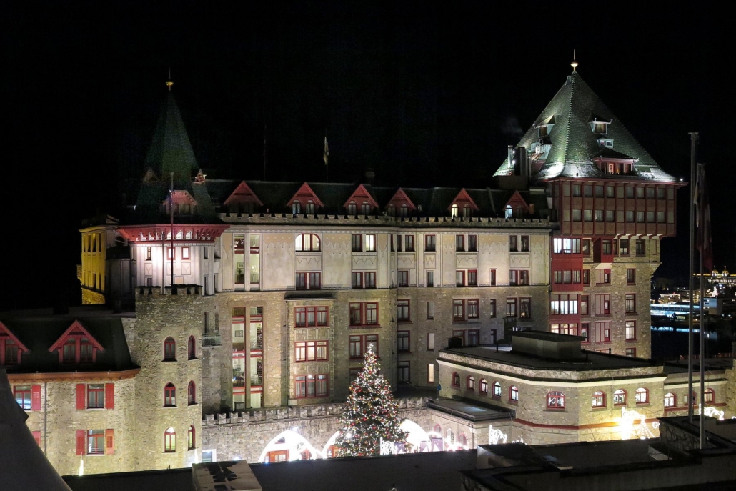 Badrutt's Palace lit up at night.