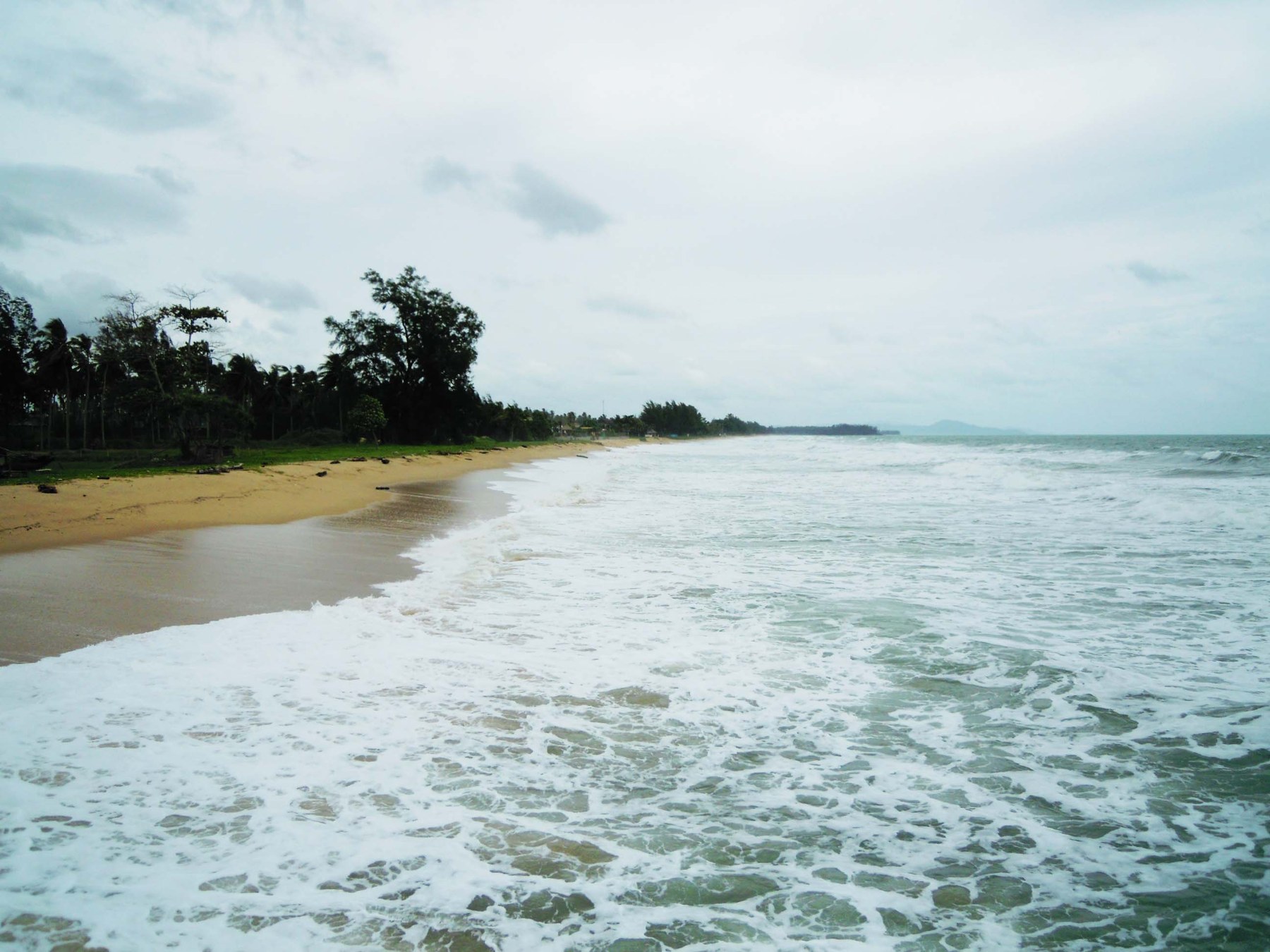 Natai Beach, the long, quiet Andaman shoreline Iniala Beach House calls home.