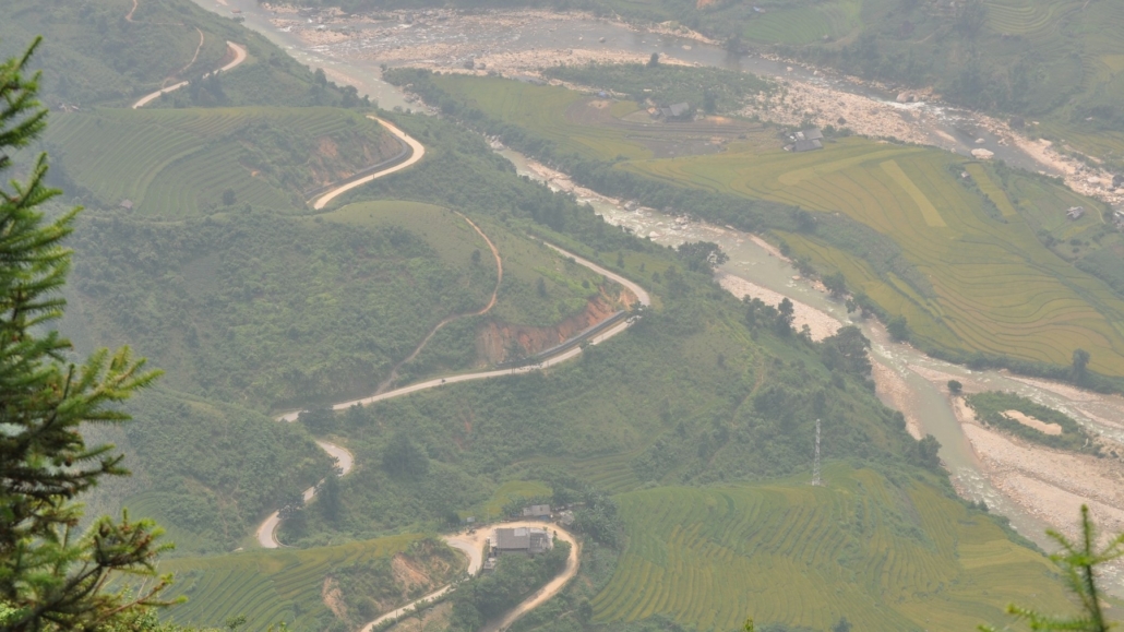 The winding valley road below the lodge.